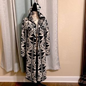Forever 21 Medium black and white full length sweater with a hood.